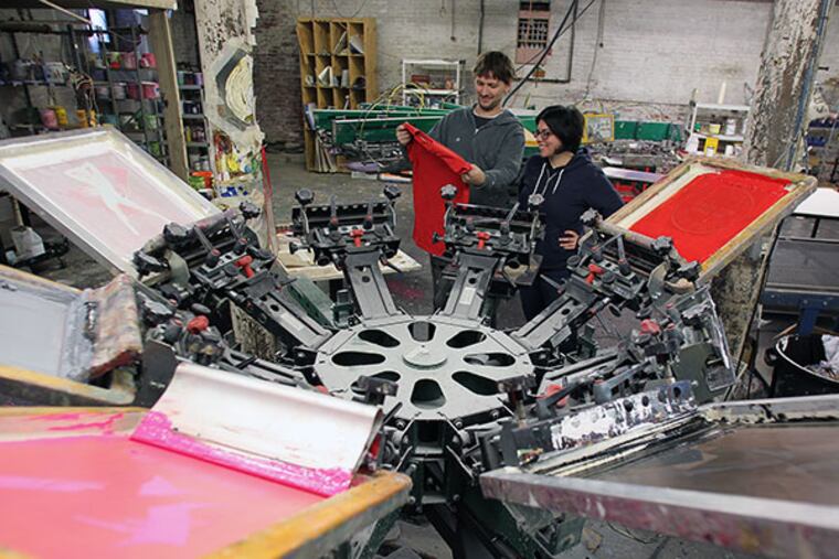 Husband-and-wife-team Jesica Simpson and Jeremy Lauderin of Derisory Designs in Philadelphia on November 14, 2013. ( DAVID MAIALETTI / Staff Photographer )