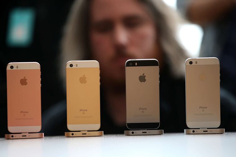 The new iPhone SE, a downsized 4-inch phone. The phones with smaller screens are selling better. But the features have been going upscale.