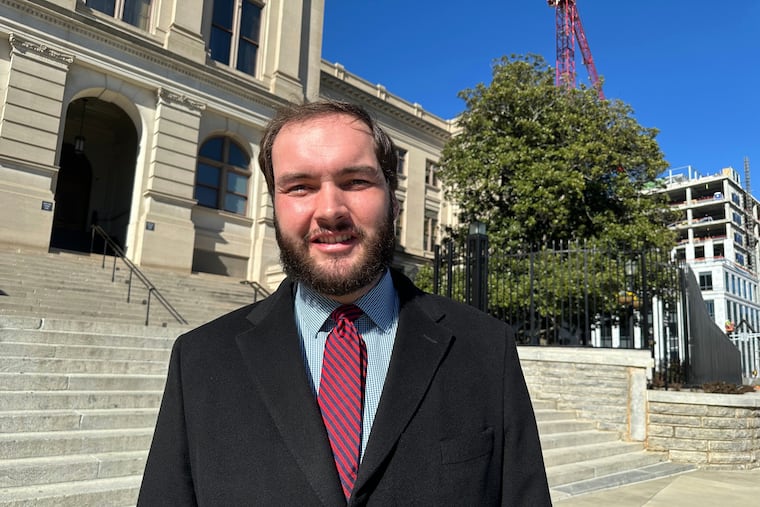 FILE - Republican Colton Moore, who resigned from the state Senate to run for Congress, poses for a photo outside the Georgia Capitol, Tuesday, Jan. 13, 2026, in Atlanta.