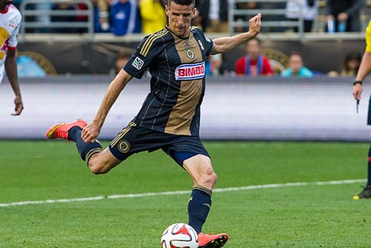 Philadelphia Union forward Sebastien Le Toux (11) takes a penalty kick and scores to tie the match against the New York Red Bulls during the second half at PPL Park. The match ended in a 2-2 draw. (John Geliebter/USA Today)