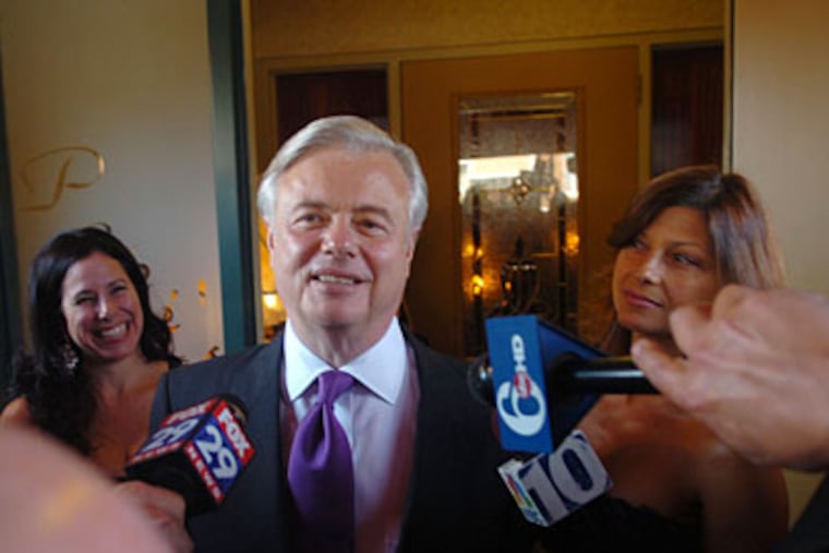 Vincent Fumo arrives with his fiance Carolyn Zinni for a combined engagement and going-away party Wednesday at Popi's Restaurant in South Philadelphia. (Sarah J. Glover / Staff Photographer)