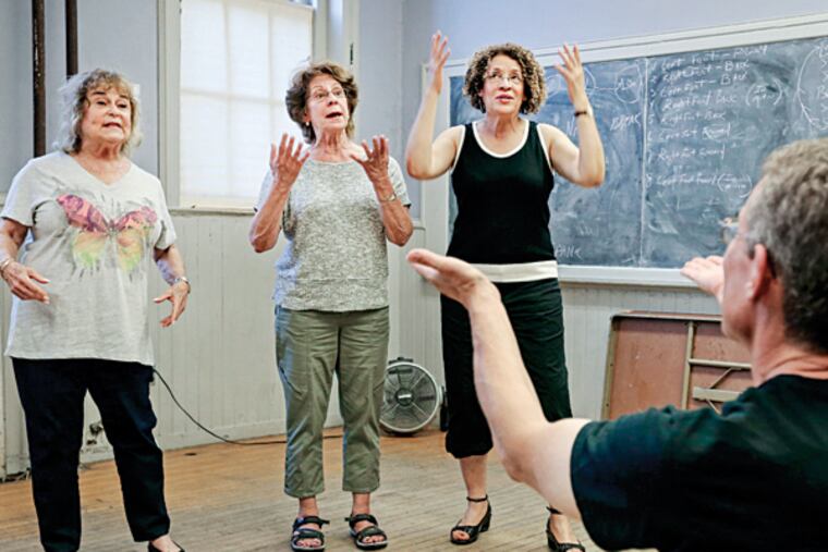Sheila Weinstein, Marilyn Fogel and Dolores Davis with facilitator Larry Kaufman doing Gripes on Doctors. (Steven M. Falk/Staff Photographer)