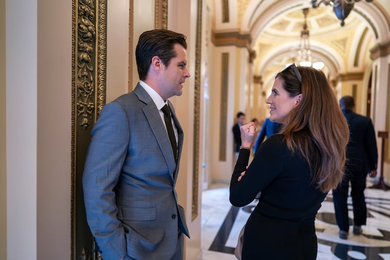 Reps. Matt Gaetz (R., Fla.) and Nancy Mace (R., S.C.) confer in the hallway near the House chamber. The two joined six other Republicans to oust House Speaker Kevin McCarthy.