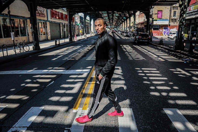 Rahmell Peeples walks in his neighborhood in Brooklyn, New York on March 26. Peebles didn’t see the need for alarm over the new coronavirus, and is one of roughly 40 million black Americans deciding minute by minute whether to put their faith in the government and medicine during the coronavirus pandemic. “I’ve just been conditioned not to trust,” Peebles said. (AP Photo/Bebeto Matthews)