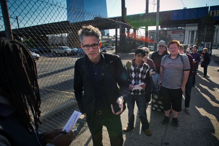 Jamer Hunt, who lives in Philadelphia and works in New York, was catching a Megabus from University City on Thursday. Amtrak said full train service would be restored between Philadelphia and New York by Tuesday. (ALEJANDRO A. ALVAREZ / Staff Photographer)