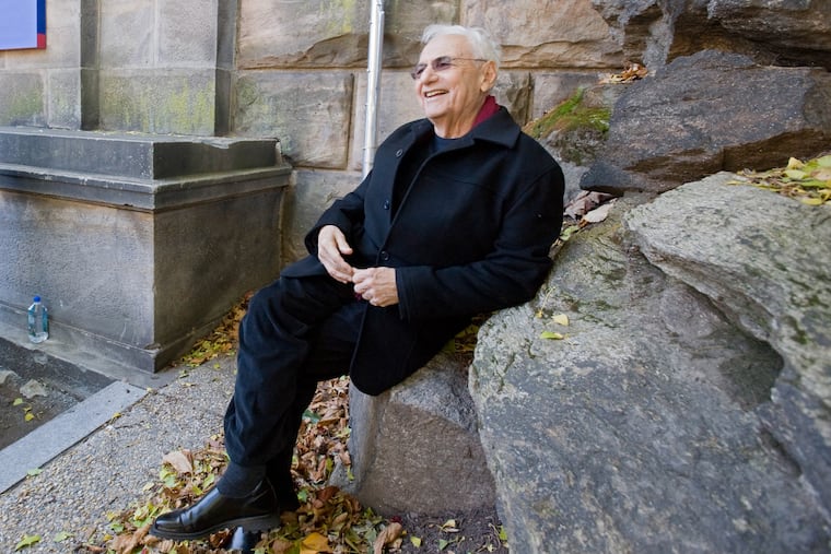 Frank Gehry relaxing on the rocks by the Philadelphia Museum of Art while waiting for a ground-breaking ceremony on Nov. 9, 2010.