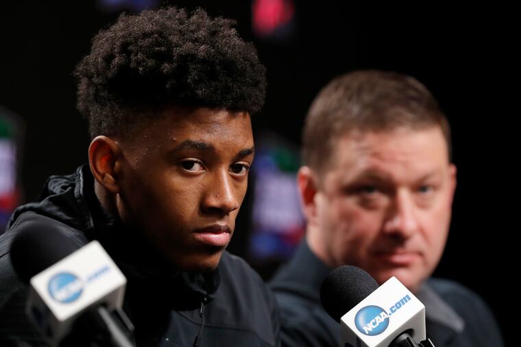 Texas Tech's Jarrett Culver, left, and head coach Chris Beard answer questions during a news conference on Sunday ahead of the NCAA championship game in Minneapolis. Texas Tech will play Virginia on Monday for the national championship.