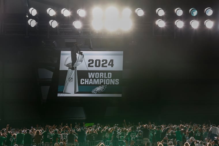 The Eagles' Super Bowl banner is unveiled before the game against the Dallas Cowboys on Thursday at Lincoln Financial Field.