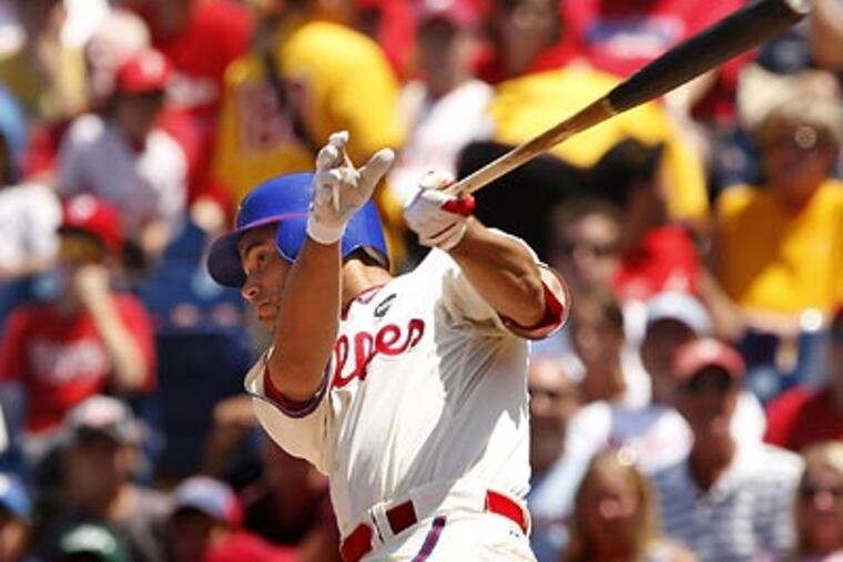 Pedro Feliz follows through on his first-inning grand slam. (Ron Cortes/Staff Photographer)