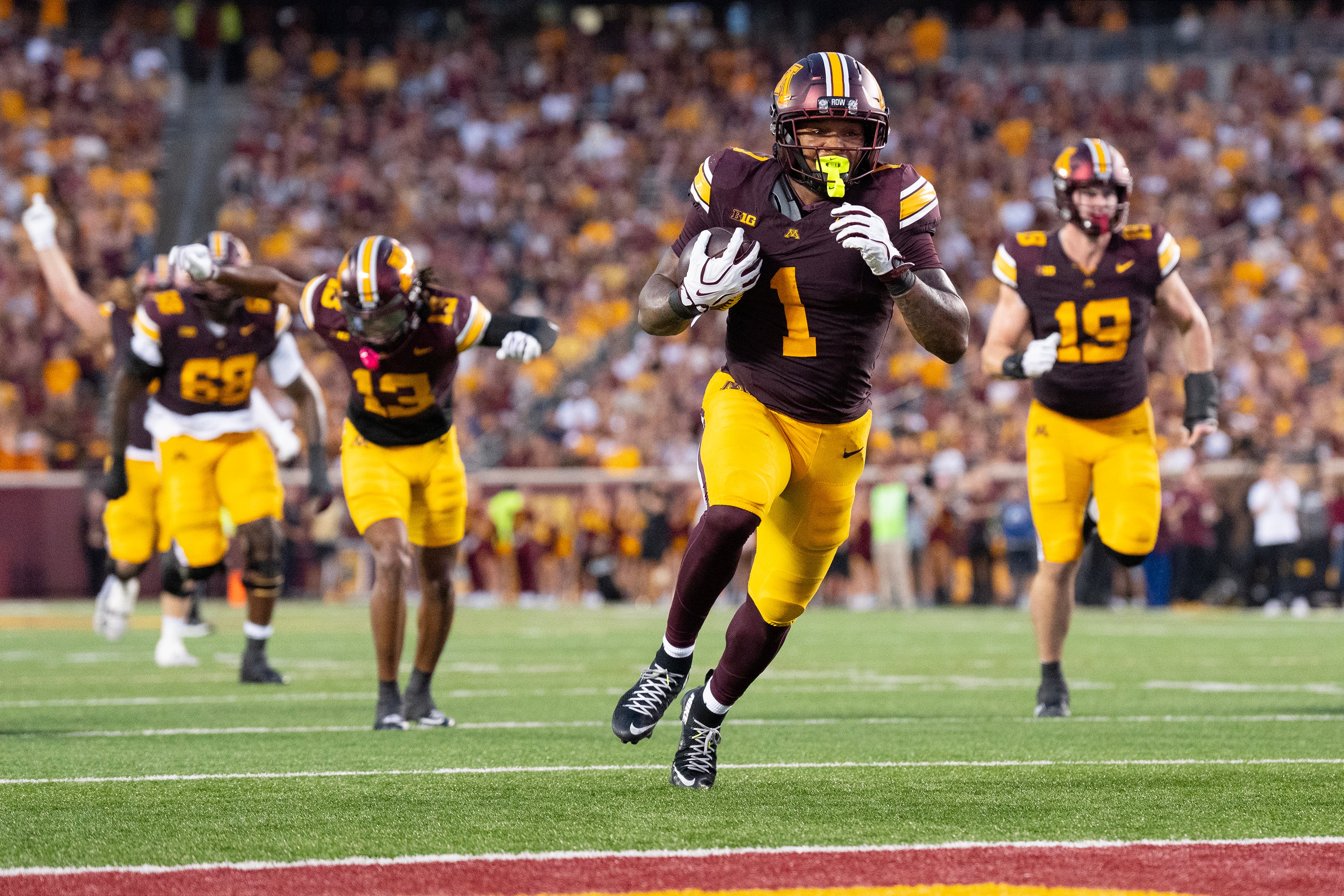 Minnesota breezes by Eastern Illinois 59-7 in the opener behind Javon Tracy's two punt return TDs