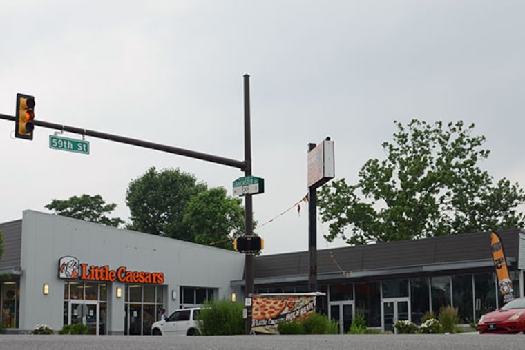 The Louise Bishop shopping center, located on the corner of 59th and Lancaster Avenue in West Philadelphia, sits partially empty on Monday, June 9, 2014. (Andrew Thayer / Staff Photographer)