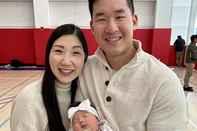 Angela and Micah with Evelyn Ruth.