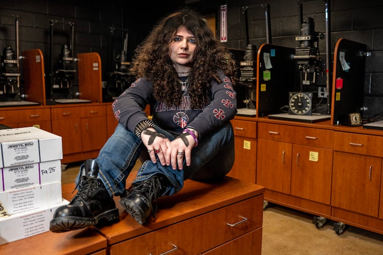 Charlotte Astor, a junior at Cherry Hill High School East, in the school’s darkroom.