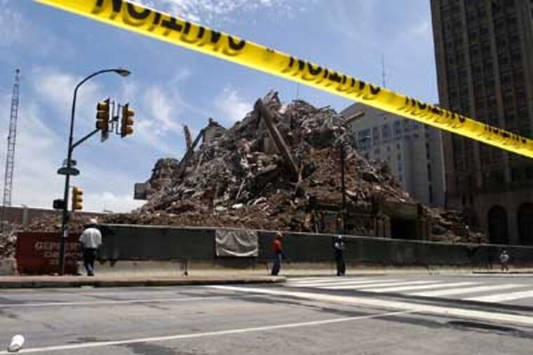 A demolished building sits on North Broad Street, which closed last week for expansion of the Convention Center.