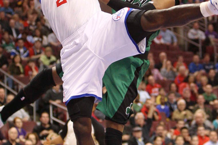 Boston's Paul Pierce fouls the 76ers' Jason Richardson in the first quarter. Richardson had 13 points for the Sixers, who won, 95-94 in overtime, on a shot by Evan Turner. STEVEN M. FALK / Staff Photographer