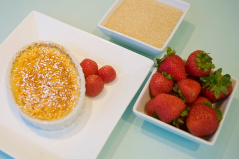 Pippo Lamberti's Creme Brulee with a side of berries.