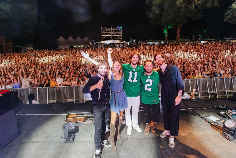 The members of Mt. Joy on the Skyline Stage at the Mann Center in September 2023. Left to right: Sotiris Eliopoulos, Jackie Miclau, Matt Quinn, Sam Cooper, and Michael Byrnes. The Philly band plays the TD Pavilion at the Mann on Friday and Saturday. Their new album is "Hope We Have Fun.'