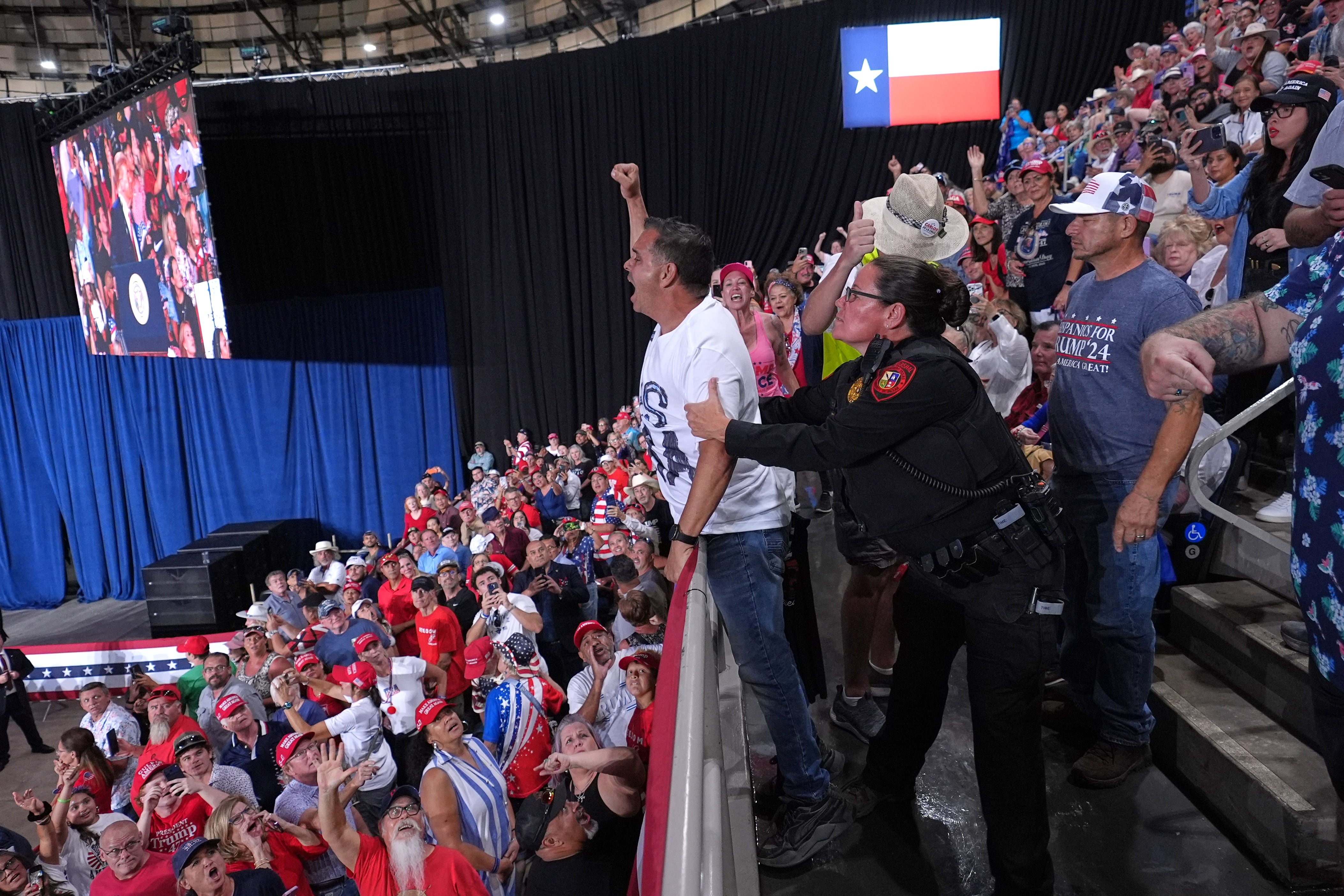 Trump rallies for Paxton in Texas Senate race as San Antonio protesters interrupt speech
