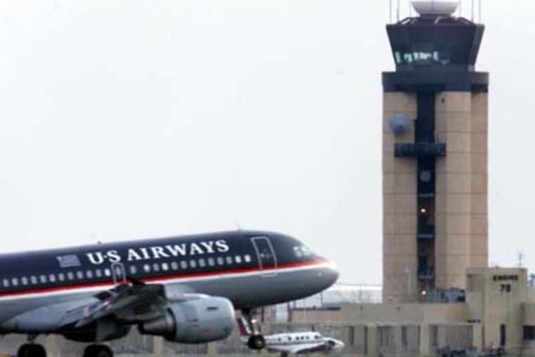 Officials said Asia service would await new planes and depend on fuel costs and government OKs. STEVEN M. FALK / Staff Photographer