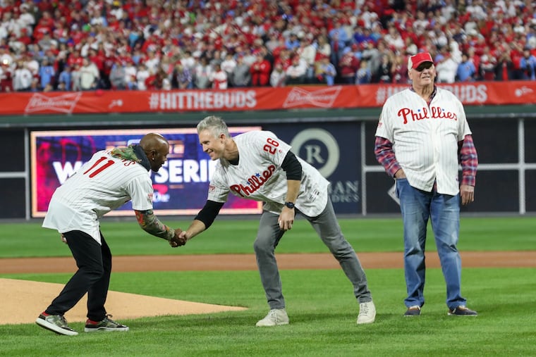 Former Phillies Jimmy Rollins (left), Chase Utley, and Charlie Manuel during the ceremonial first pitch before the World Series in 2022.