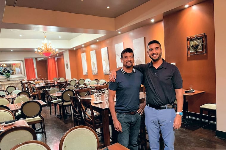 Anthony Logan (left) and his son, Kevin Ramlochan, at Flambo, 205 S. 13th St.