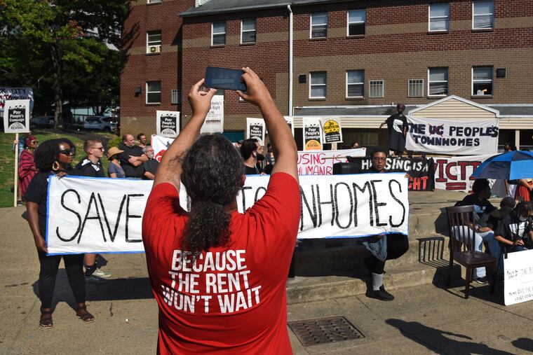 Supporters and residents who face eviction gathered for an interfaith service in the courtyard of the University City Townhomes earlier this month. Because of expiring affordable housing contracts, the city estimates that there are 14,500 households that could face the same fate as residents of the townhomes over the next decade.