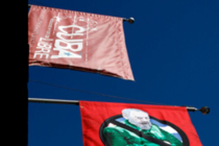 Cuba Libre's politics are displayed for all to see: a "ban Fidel Castro" banner.