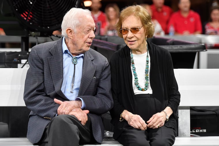 FILE - In this 2018 file photo former President Jimmy Carter and Rosalynn Carter are seen ahead of an NFL football game between the Atlanta Falcons and the Cincinnati Bengals in Atlanta. Jimmy and Rosalynn Carter have been best friends and life mates for nearly 80 years. Now with the former first lady's death at age 96, the former president must adjust to life without the woman who he credits as his equal partner in everything he accomplished in politics and as a global humanitarian after their White House years.