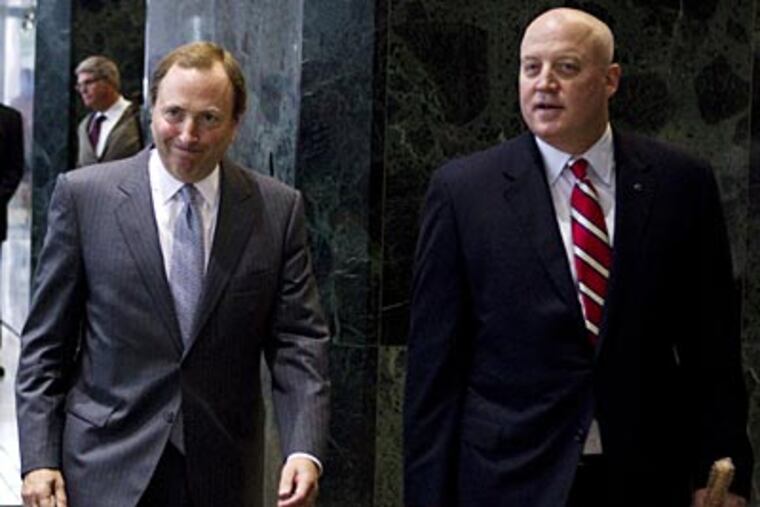 "While not ideal, we will have to keep all options open on how to best proceed," Bill Daly (right) said. (AP/The Canadian Press)