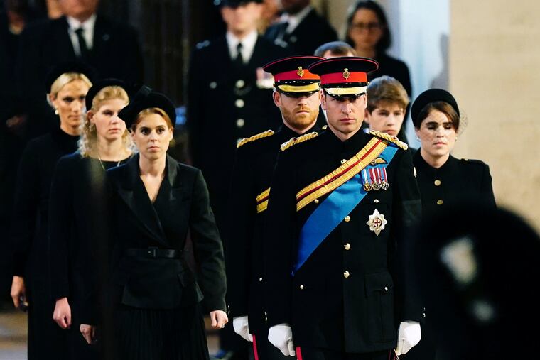 From left to right: Zara Tindall, Lady Louise, Princess Beatrice, Prince William, the prince of Wales, Prince Harry, Princess Eugenie, Viscount James Severn, and Peter Phillips.