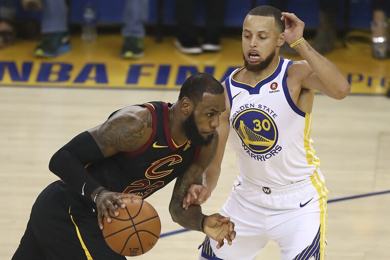 LeBron James (left) and Steph Curry are battling for an NBA title, but they agree on one thing: Neither the Cavaliers or the Warriors plan to attend a future White House celebration.