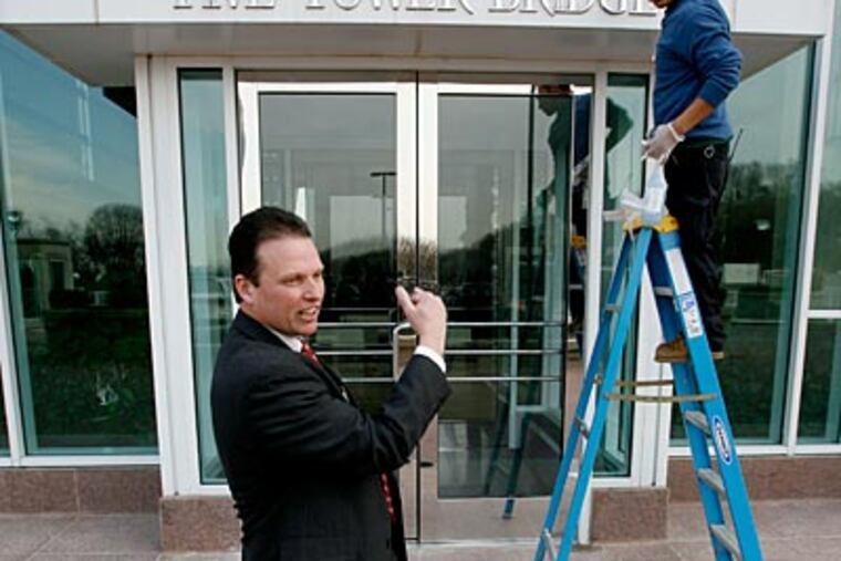 Michael Mortka (left) manages three buildings in the Tower Bridge office complex in West Conshohocken and Conshohocken. ( Charles Fox / Staff Photographer )