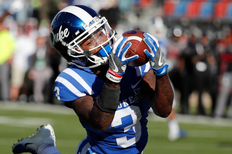 Duke wide receiver T.J. Rahming hauls in a touchdown pass against during the first half of the Blue Devils' 56-27 blowout of Temple in the Independence Bowl. (Rogelio V. Solis / AP Photo/)