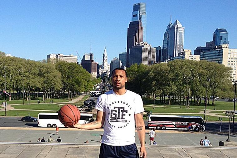Brian Smith, a 27-year-old basketball trainer and instructor from North Philadelphia, fulfilled his mission Sunday to dribble a basketball the entire 10 miles of the Broad Street Run. (Handout photo)