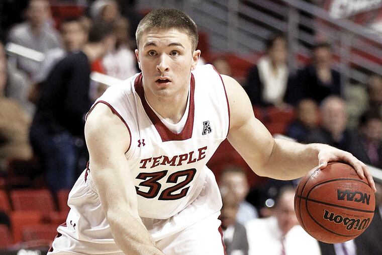 Temple's Dalton Pepper dribbles the basketball.