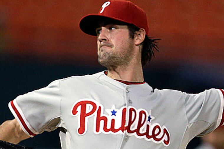 Cole Hamels' 13 strikeouts last night raised his total for the season to 201. (Lynne Sladky/AP)