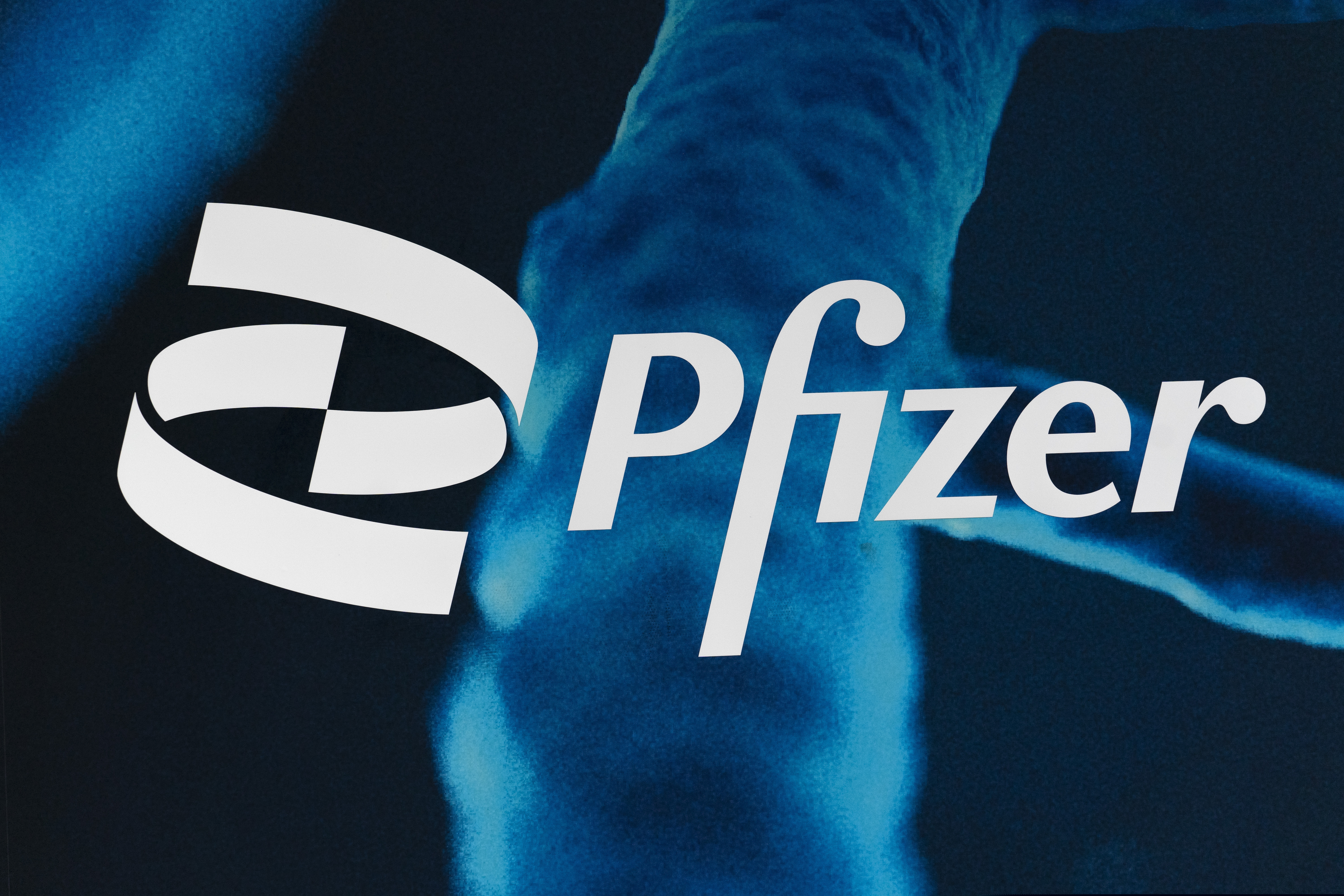 The Pfizer logo is displayed at the company's headquarters, Feb. 5, 2021, in New York.