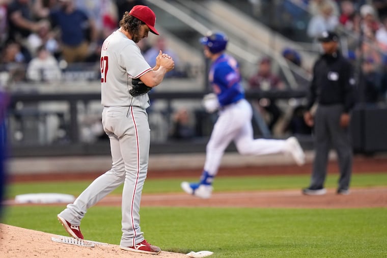 Phillies starting pitcher Aaron Nola allowed a two-run home run to Mark Canha and later gave up a two-run single to the Mets left fielder in a 4-1 loss.
