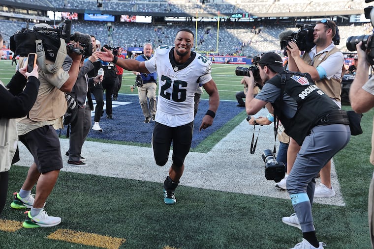 Philadelphia Eagles running back Saquon Barkley runs off the field after a 28-3 win over the New York Giants at MetLife Stadium.