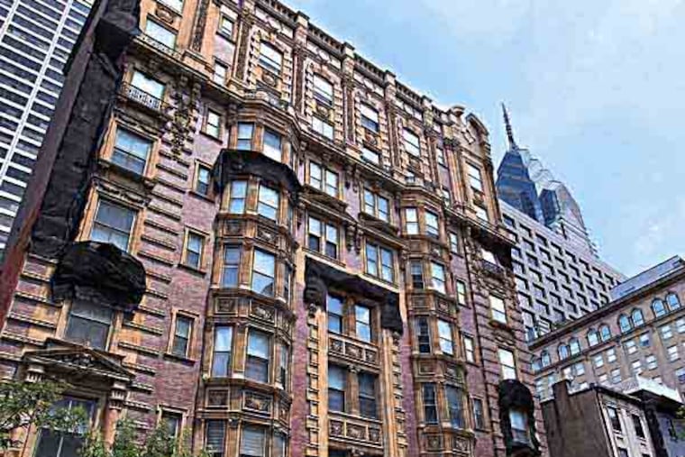 The Belgravia Condo Association has successfully sued the developer and engineer who converted the old Center City hotel, the Belgravia, left, into condos in 2006 over alleged violations of the state uniform condo act. A 9 member jury awarded $5.05 million to the association; the defendants are back in court pondering an appeal. The exterior of the Belgravia on July 18, 2013. ( CHARLES FOX / Staff Photographer )