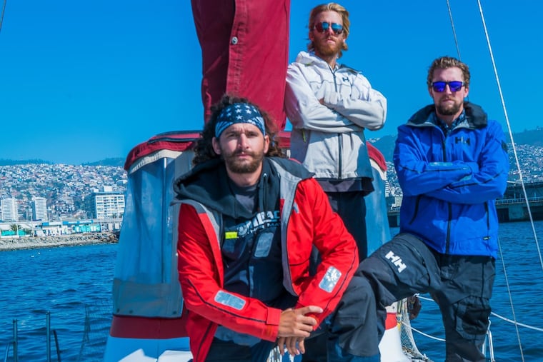 The crew of 'The Ole Lady' (left to right): Taylor Grieger, Stephen O'Shea, and John Rose. Grieger and Rose are U.S. Navy veterans, and O'Shea writes frequently about veterans' issues. This photo was taken in Valdivia, Chile, from where they sailed south and then around Cape Horn, in 2018.