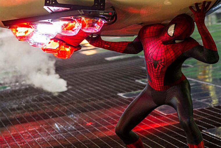 Andrew Garfield stars as Spider-Man in "The Amazing Spider-Man," also starring Emma Stone. (Columbia Pictures)