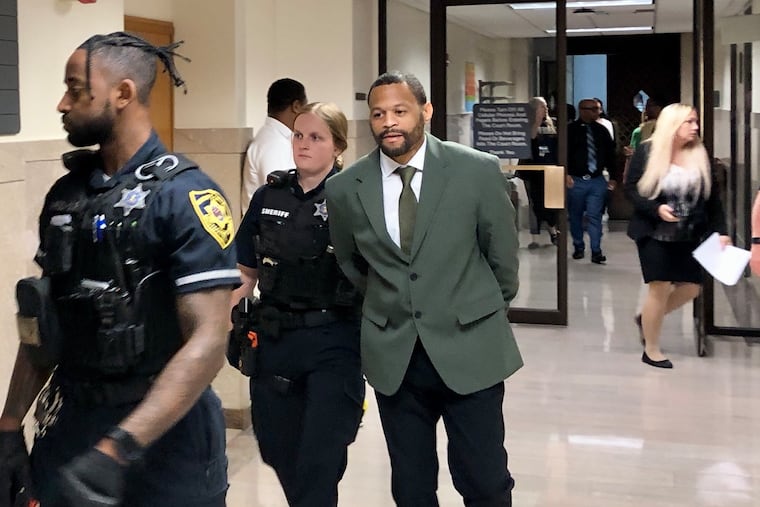 Kevin Morgan is escorted out of the courtroom at the Montgomery County Courthouse as a jury began to deliberate in his trial for first-degree murder and related crimes.