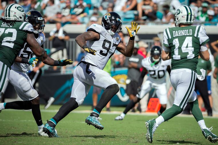 Malik Jackson chases after Jets quarterback Sam Darnold during a September 2018 game. His ability to pursue quarterbacks from the inside is one of the reasons the Eagles signed him.