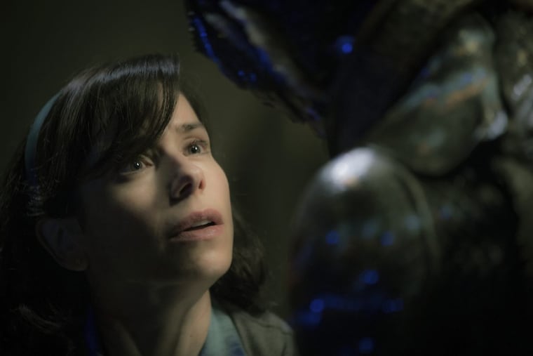 Sally Hawkins, left, and Doug Jones in a scene from the film “The Shape of Water.”