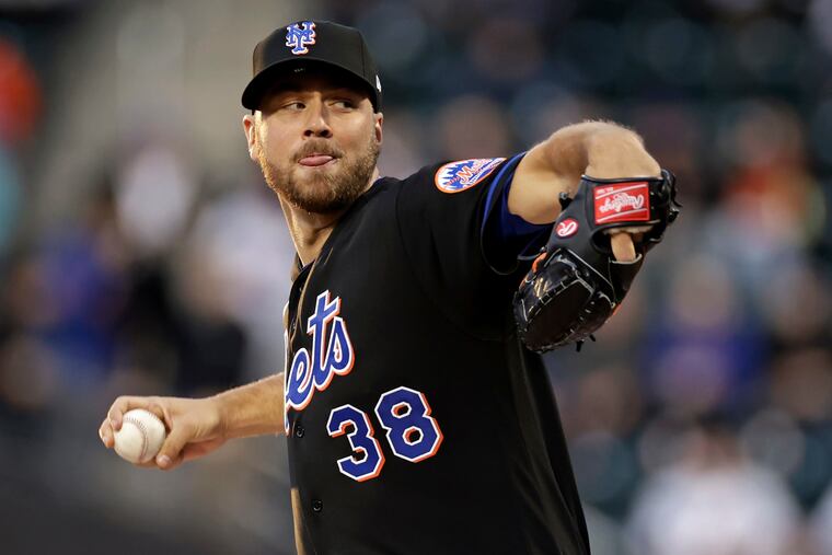 New York Mets pitcher Tylor Megill throws during the first inning of the team's baseball game against the Philadelphia Phillies on Friday, April 29, 2022, in New York. (AP Photo/Adam Hunger)