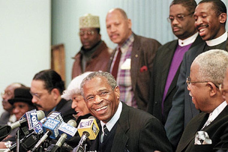 Black civic and clergy leaders announce their choice, Alex Talmadge Jr., to unseat District Attorney Lynne M. Abraham in 2001. He lost. At center is
Charles Bowser, who helped in the search. (File photo: G.W. Miller II / Staff Photographer)