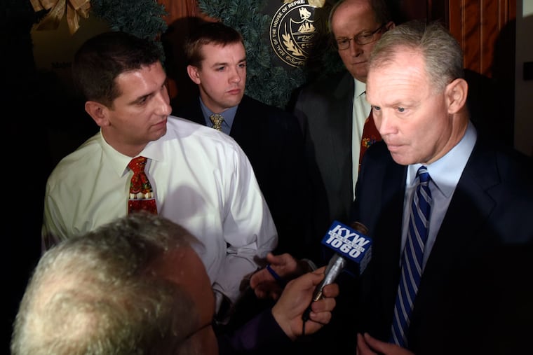 In the state Capitol, House Speaker Mike Turzai (right) and Majority Leader Dave Reed discuss the budget negotiations, which led to no agreement, as has been in the case for months.