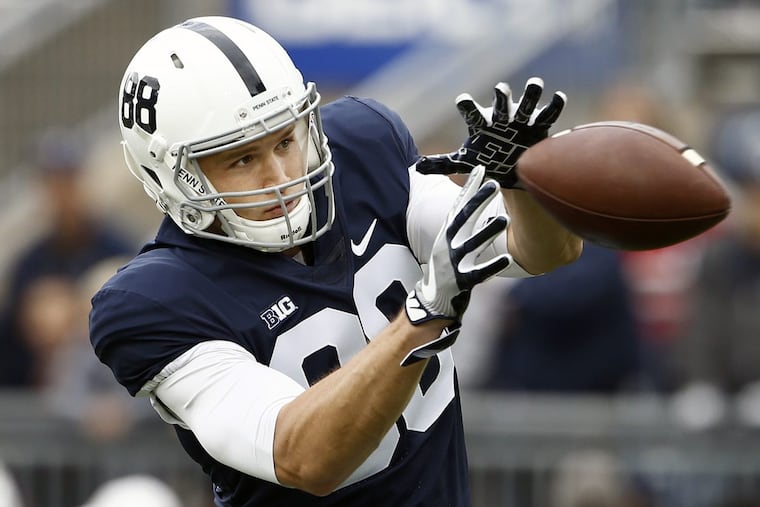 Mike Gesicki , warming up before a game.