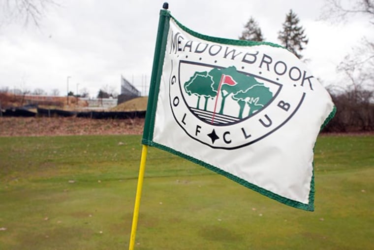 The Phoenixville Area School District recently voted to seize the Meadowbrook Golf course and acquire it through eminent domain. The property has been owned by the Brown family since 1896. Here, a flag flies over the 6th green on Wednesday, November 27, 2013. ( ED HILLE / Staff Photographer )